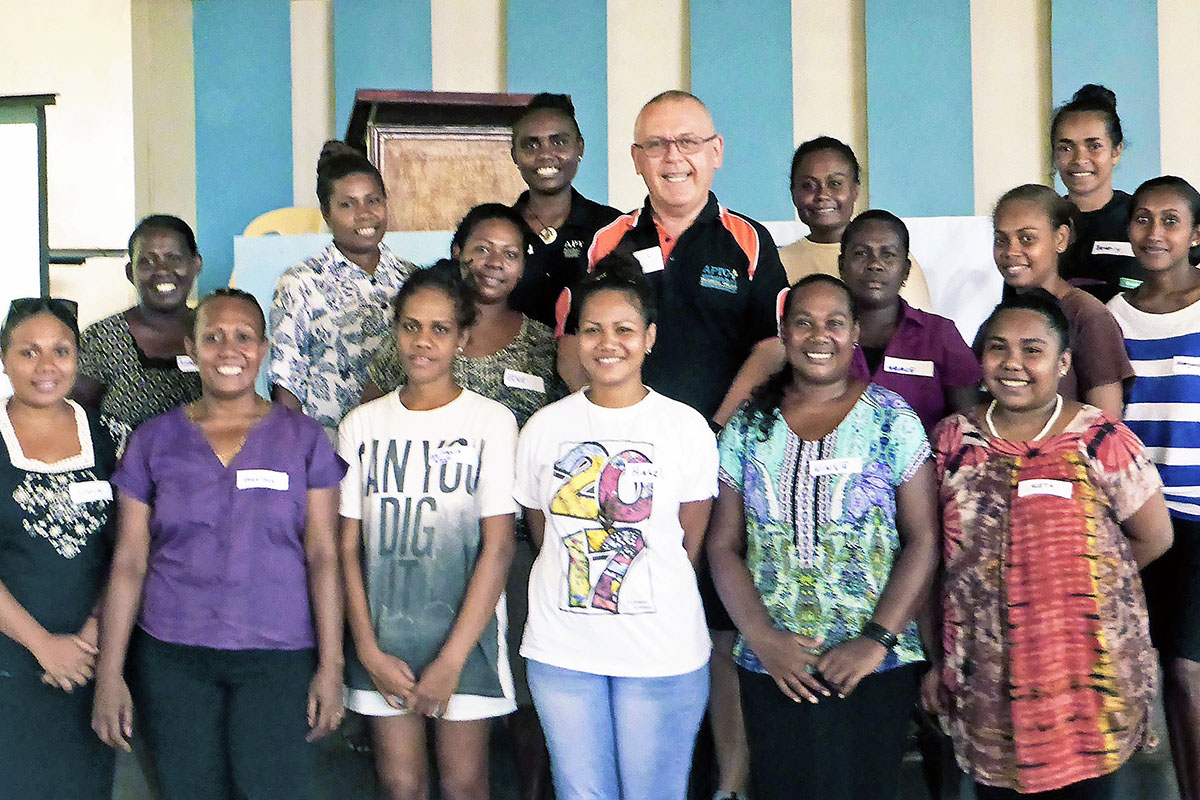 APTC Certificate III in Hospitality (multi-skill small accommodation) students with their trainer Mr William Hetherington and tutor, Ms Molina Kwato’o.