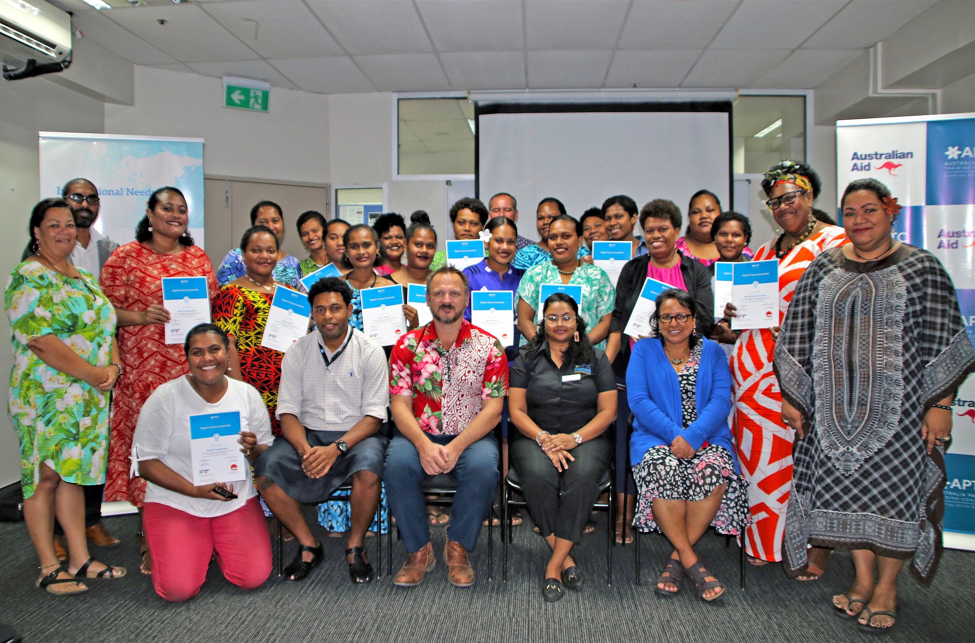 Participants with their certificates after completing the Digital Literacy Essentials micro-credential course (MC00013) 